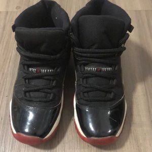 Bread 11 Jordan’s worn some scratches but I believe they can still be worn sz..6